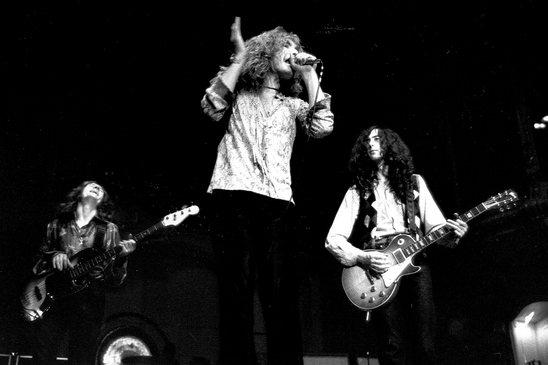 DUSSELDORF - MARCH 11: Singer Robert Plant, bassist John Paul Jones and guitarist Jimmy Page of the rock band 'Led Zeppelin' perform onstage on March 11, 1970 in Dusseldorf, Germany. (Photo by Michael Ochs Archives/Getty Images)