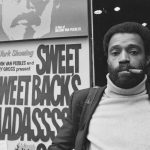 American actor and filmmaker Melvin Van Peebles in New York City, 1971. He is posing outside a cinema which is showing his action thriller 'Sweet Sweetback's Baadasssss Song'. (Photo by Pix/Michael Ochs Archives/Getty Images)