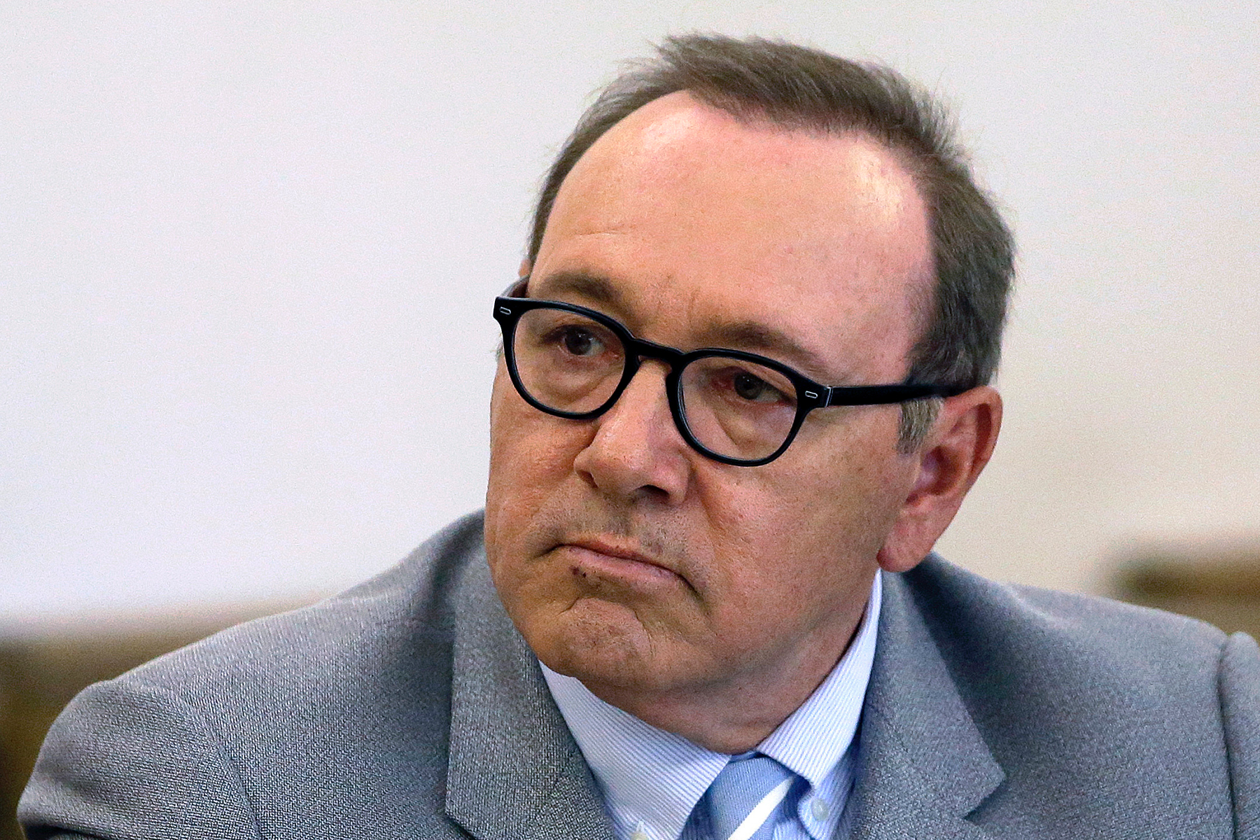 FILE - In this June 3, 2019 file photo, actor Kevin Spacey attends a pretrial hearing at district court in Nantucket, Mass. The Oscar-winning actor is accused of groping the teenage son of a former Boston TV anchor in 2016 in the crowded bar at the Club Car in Nantucket. An attorney for the man who has accused Spacey says, Wednesday, June 19, 2019, that the man cannot find a cellphone he has been ordered to turn over to the defense. Spacey's lawyers want to try to recover text messages they say would help the actor's case. (AP Photo/Steven Senne)