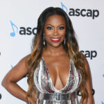 Kandi Burruss Is Shining In Her Latest Photos In A Gorgeous Velvet Pink Dress