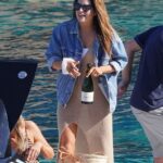 Luciendo bien: Binky Felstead cortó una figura elegante con un maxi vestido beige transparente durante un viaje en bote borracho en su despedida de soltera a Ibiza el sábado