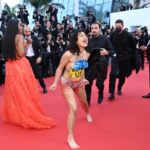 Cannes: Manifestante en topless interrumpe la alfombra roja de 'Tres mil años de añoranza'