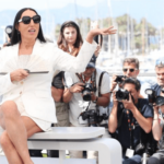 Rossi De Palma in a suit with short shorts and other guests on the second day of the Cannes Film Festival