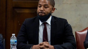 Actor Jussie Smollett listens as his sentence is read at the Leighton Criminal Court Building, Thursday, March 10, 2022, in Chicago. Jussie Smollett maintained his innocence during his sentencing hearing Thursday after a judge sentenced the former “Empire” actor to 150 days in jail for lying to police about a racist and homophobic attack that he orchestrated himself.(Brian Cassella/Chicago Tribune via AP, Pool)