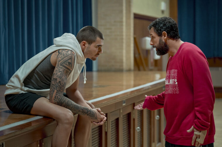 HUSTLE. (L-R) Juancho Hernangomez as Bo Cruz and Adam Sandler as Stanley Sugerman in Hustle. Cr. Scott Yamano/Netflix © 2022.