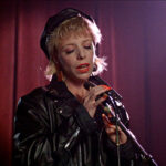 Julee Cruise sings the show's theme song "Falling", from the pilot episode of the hit television series 'Twin Peaks', 1990. (Photo by CBS Photo Archive/Getty Images)
