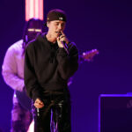 LAS VEGAS, NEVADA - APRIL 03: Justin Bieber performs onstage during the 64th Annual GRAMMY Awards at MGM Grand Garden Arena on April 03, 2022 in Las Vegas, Nevada. (Photo by Rich Fury/Getty Images for The Recording Academy)