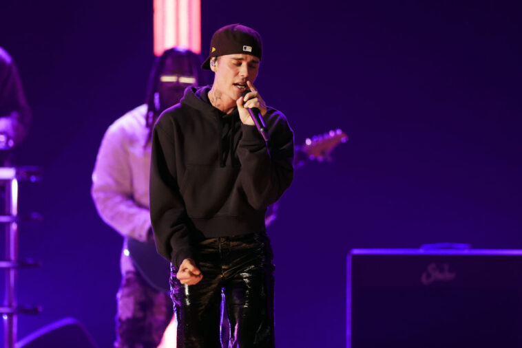 LAS VEGAS, NEVADA - APRIL 03: Justin Bieber performs onstage during the 64th Annual GRAMMY Awards at MGM Grand Garden Arena on April 03, 2022 in Las Vegas, Nevada. (Photo by Rich Fury/Getty Images for The Recording Academy)