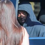 Almuerzo: Kanye 'Ye' West lució un aspecto relajado mientras salía del lugar de encuentro de celebridades Nobu en Malibú el lunes, después de un almuerzo tardío.