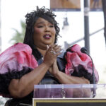 Singer Lizzo speaks during a ceremony to award hip hop artist Missy Elliott a star on the Hollywood Walk of Fame, Monday, Nov. 8, 2021, in Los Angeles. (AP Photo/Chris Pizzello)