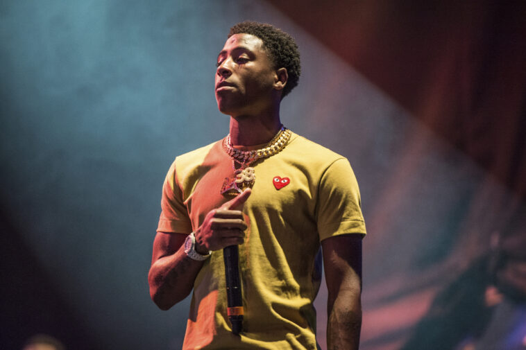 FILE - In this Aug. 25, 2017, file photo, NBA YoungBoy performs at the Lil' WeezyAna Fest at Champions Square in New Orleans. Rap artist NBA YoungBoy is among 16 people who have been arrested on drug and firearm charges in Louisiana’s capital city. Baton Rouge police say the 20-year-old rapper faces multiple drug charges following a gathering Monday night, Sept. 28, 2020, in Baton Rouge. (Photo by Amy Harris/Invision/AP, File)