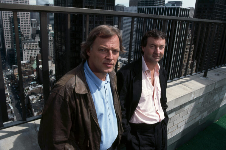 Guitarist David Gilmour (left) and drummer Nick Mason of English rock group Pink Floyd posed together on a roof top in New York, May 1988.