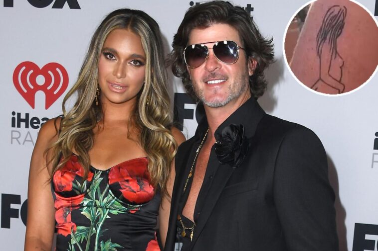 Robin Thicke se tatúa el cuerpo desnudo de su prometida April Love Geary