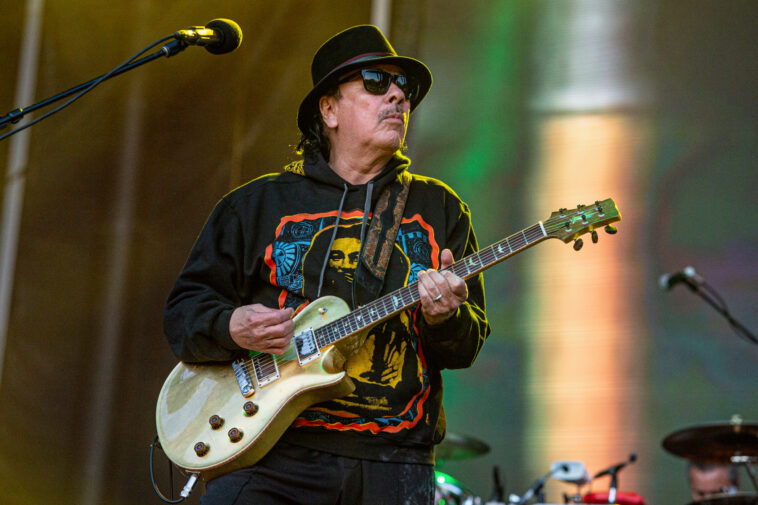 Carlos Santana Collapses Onstage Due to 'Heat Exhaustion'