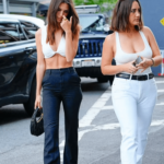 In A Plunging White Bra And A Pair Of Black Slacks, Emily Ratajkowski Attracted Attention