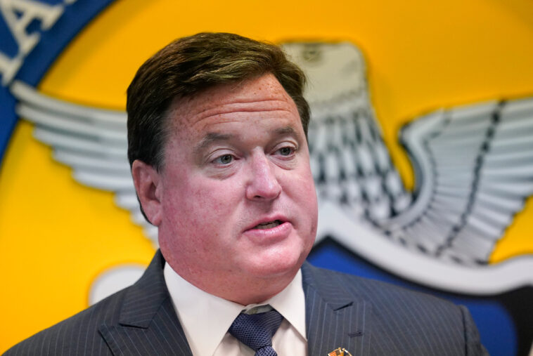 FILE - In this Sept. 16, 2020 file photo, Republican attorney general candidate Todd Rokita speaks during a news conference in Indianapolis. (AP Photo/Darron Cummings, File)