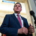 Sen. Joe Manchin, D-W.Va., speaks to the media in the Russell Building on Thursday, January 13, 2022.