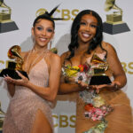 LAS VEGAS, NEVADA - APRIL 03: Doja Cat and SZA winners of the Best Pop Duo Group Performance Award for 'Kiss Me More' pose in the winners photo room during the 64th Annual GRAMMY Awards at MGM Grand Garden Arena on April 03, 2022 in Las Vegas, Nevada. (Photo by David Becker/Getty Images for The Recording Academy)