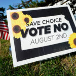 Olathe, KANSAS - AUGUST 01: A Vote No to a Constitutional Amendment on Abortion sign is on display outside a polling station on August 01, 2022 in Olathe, Kansas.  On August 2, voters will vote on whether or not to remove protection for abortion from the state constitution. (Photo by Kyle Rivas/Getty Images)