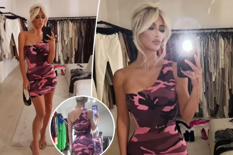 Kim Kardashian se llena de Barbiecore con un minivestido de camuflaje rosa