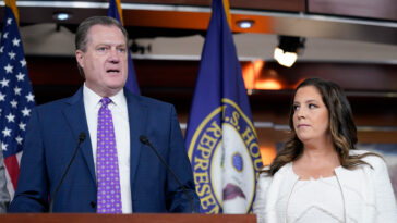 House Intelligence Committee ranking member Rep. Mike Turner, R-Ohio, left, speaks during a news conference on Capitol Hill in Washington, Friday, Aug. 12, 2022, on the FBI serving a search warrant at former President Donald Trump's home in Florida. Rep. Elise Stefanik, R-N.Y., listens at right. (AP Photo/Susan Walsh)