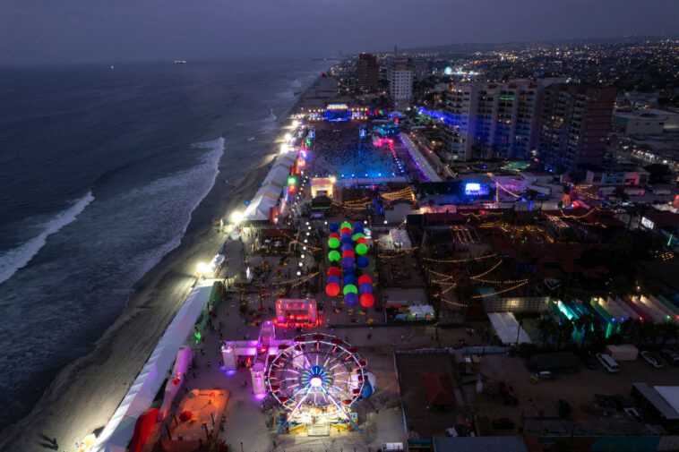 This aerial view shows the Baja Beach Fest music festival in Playas de Rosarito, Baja Caifornia, Mexico August 21, 2021, amid the coronavirus pandemic. (Photo by Guillermo Arias / AFP) (Photo by GUILLERMO ARIAS/AFP via Getty Images)