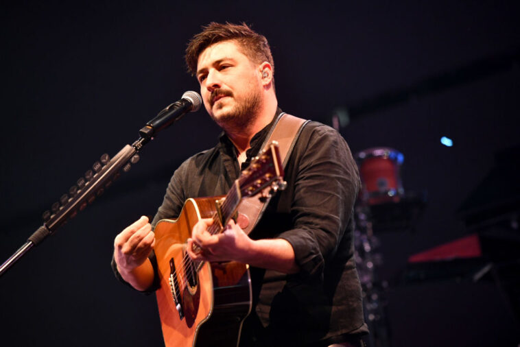 ANAHEIM, CALIFORNIA - DECEMBER 08:  Singer Marcus Mumford of Mumford and Sons performs onstage during the KROQ Absolut Almost Acoustic Christmas 2019 at Honda Center on December 08, 2019 in Anaheim, California. (Photo by Scott Dudelson/Getty Images)