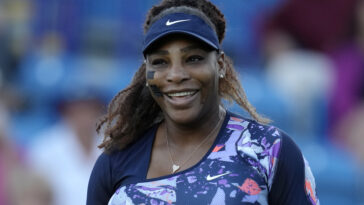 Serena Williams of the United States laughs during her quarterfinal doubles tennis match with Ons Jabeur of Tunisia against Shuko Aoyama of Japan and Hao-Ching of Taiwan at the Eastbourne International tennis tournament in Eastbourne, England, Wednesday, June 22, 2022. (AP Photo/Kirsty Wigglesworth)