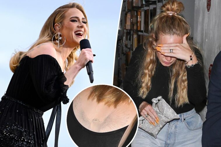Adele parece estar quitándose el tatuaje de la espalda