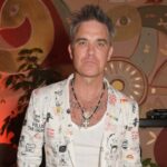 Robbie Williams 'extraña los días' de pelear con Noel Gallagher