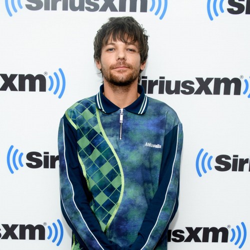 louis tomlinson sorprendido por el álbum número uno del reino unido